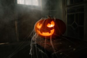 jack o lantern covered in spider web